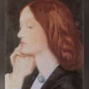 close up detail shows face of young woman, pensive, red hair
