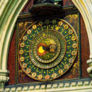 thumbnail image shows dial of ancient clock face, ornate