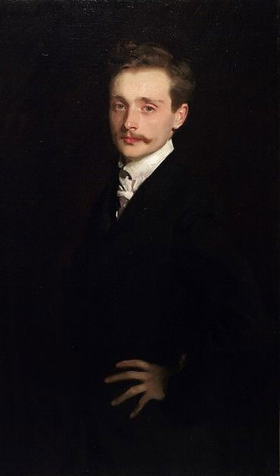 young Edwardian gentleman with moustache, sombre clothing, black suit