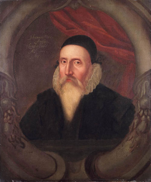 portrait of elizabethan man in dark clothing of a scholar, skull cap, white beard