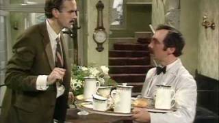 hotel manager and waiter speaking