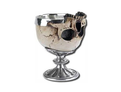 old silver cup in form of skull