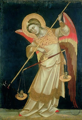angel with weighing scales and halo