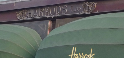 exterior of department store, with awning and decorative window frames