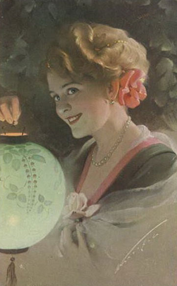young woman holding paper lantern, illuminated, smiling, at feast of St Martin