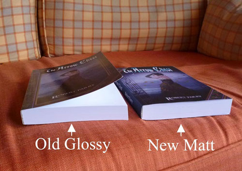 photo of two books, edgeways to indicate curl of covers and virtues of matt covers remaining flat
