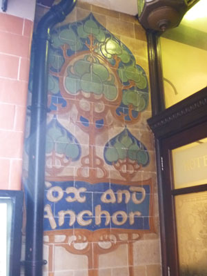 tiled entrance to a pub, decorative style