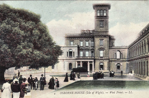 victorian italianate style house, large towers, people in foreground