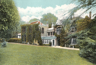 old colour print of Victorian building set in gardens with trees and lawn