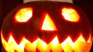 pumpkin hollowed out, illuminated within