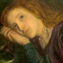 wistful face of reclining woman 