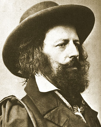 old photo of the poet Alfred Lord Tennyson with beard and in large hat