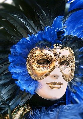 woman in elaborate carnival mask, blue