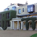 victorian house with gravel drive and ivy clad walls