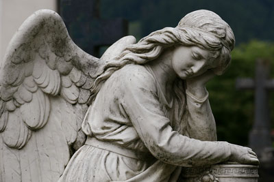 stone statue of grieving angel, memorial 